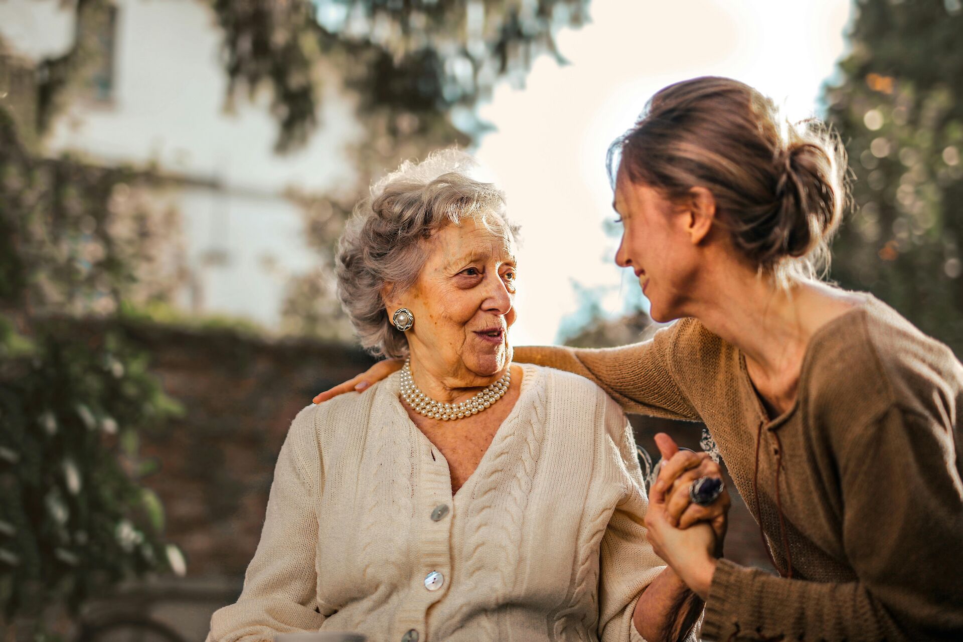 Old and young women embracing
