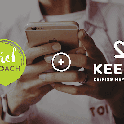 Partnership banner showing the Grief Coach logo and the Keeper logo, over a photo of a person holding a smartphone