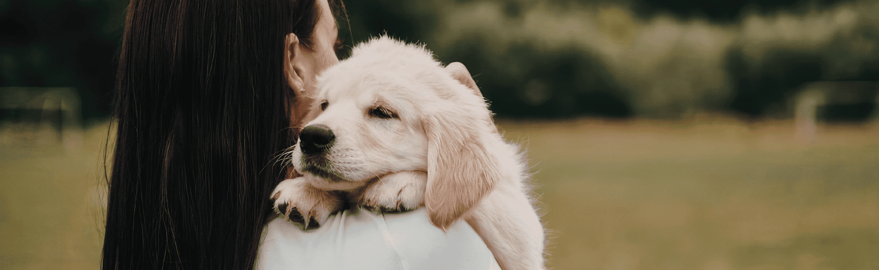 Woman holding dog