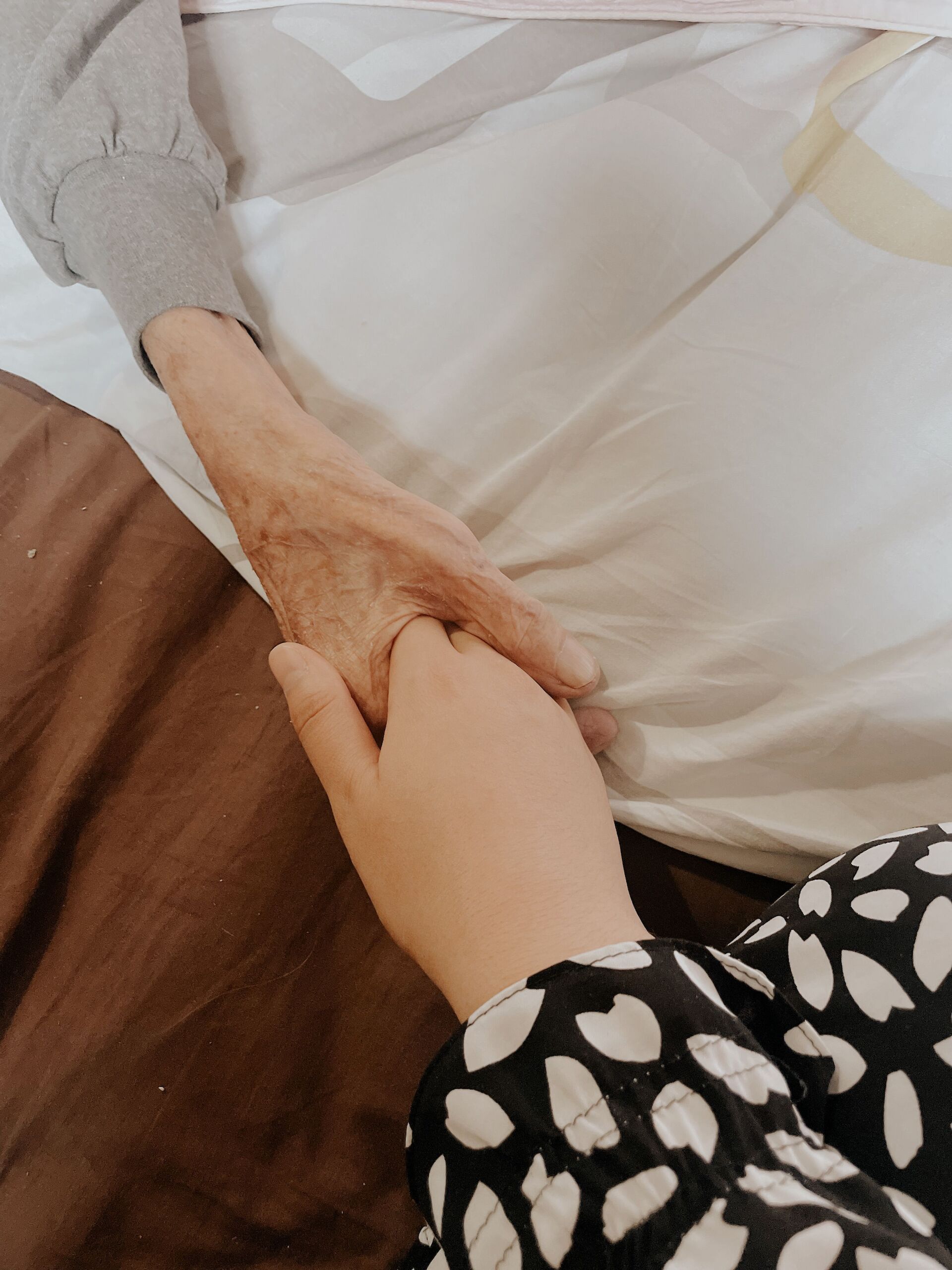 daugther-holding-hand-grief-mom